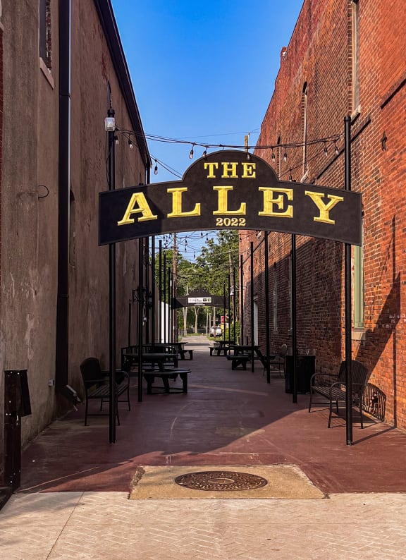 the sign for the alley
