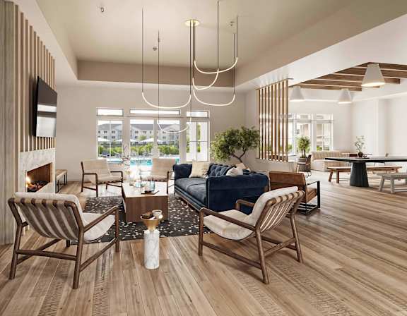 Clubhouse interior at Lakeview Terrace apartments in Ridgeland featuring modern seating, warm lighting, and an inviting community lounge space.
