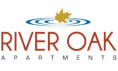 the logo for river oaks apartments with a maple leaf on a water puddle at River Oak Apartments, PRG Real Estate, Louisville, KY