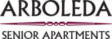 a logo with two pink pens