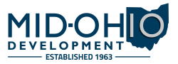 the logo for the midtown development project at night
