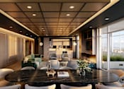 Thumbnail 5 of 8 - A modern dining room with a large table and chairs.