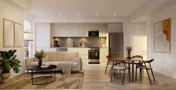 A modern living room with a dining table and chairs.