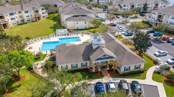 an aerial view of a house with a swimming pool