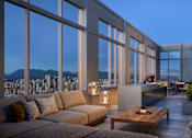 Thumbnail 8 of 8 - A modern living room with a view of the city at dusk.
