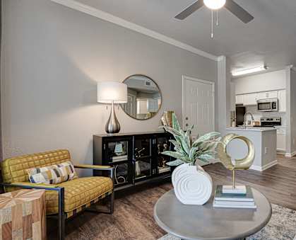 a living room with furniture and a ceiling fan at Mason, Texas
