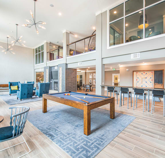 clubhouse lounge game room and pool table
