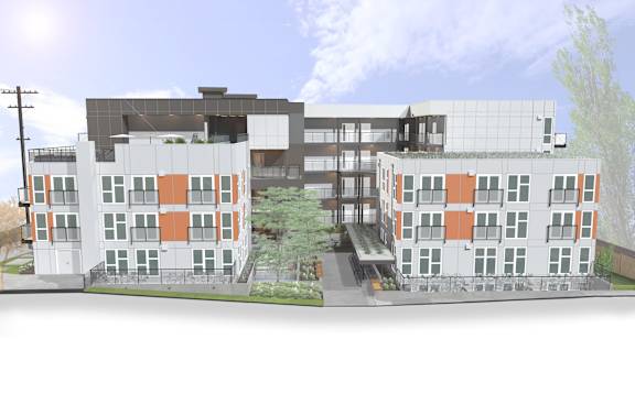 A modern building with orange and white accents.