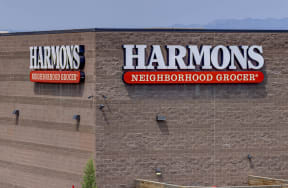 a sign on the side of a building that reads harons neighborhood grocery