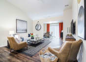 Thumbnail 3 of 10 - Superior Township MI Apartment Rentals Redwood Apartment Neighborhoods Redwood Superior Township Living Room To Den