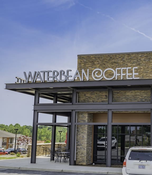a wateran coffee building with cars parked in front of it at Preston Ridge, Hickory North Carolina