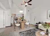 Thumbnail 17 of 29 - A modern living room with a dining table and chairs. at AVIA Lofts on Parkway, Vancouver Washington