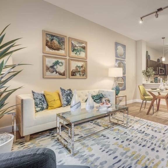 a living room with a couch and a table