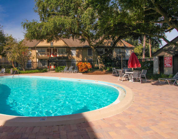 take a dip in our resort style pool at Foxcroft Apartments, Florida
