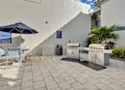 Thumbnail 11 of 26 - Outdoor grills at Avia Apartments at Reedy Creek, Kissimmee, Florida