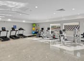 Thumbnail 23 of 26 - Workout Area at Avia Apartments at Reedy Creek, Kissimmee, FL, 34747