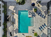 Thumbnail 10 of 26 - Large Outdoor Pool Area at Avia Apartments at Reedy Creek, Kissimmee, FL