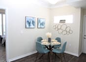 Thumbnail 7 of 18 - View of the dining room model home at Harbour Breeze Apartments in Suffolk Virginia