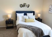 Thumbnail 9 of 18 - View of the bedroom in the model home at Harbour Breeze Apartments in Suffolk Virginia