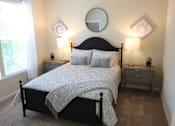 Thumbnail 8 of 18 - View of the bedroom in the model home at Harbour Breeze Apartments in Suffolk Virginia