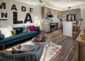 Thumbnail 20 of 27 - Kitchen and living room with seating