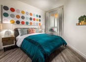 Thumbnail 21 of 27 - Bedroom with wall decor and large window