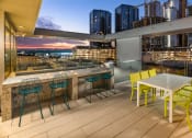 Thumbnail 7 of 27 - Roof top with table and chair seating