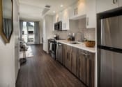 Thumbnail 19 of 27 - Kitchen with steal appliances