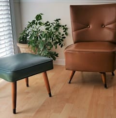 a leather chair and in a living room