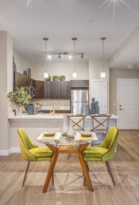 Living room and kitchen at Incline at Anthem senior apartments in Herriman