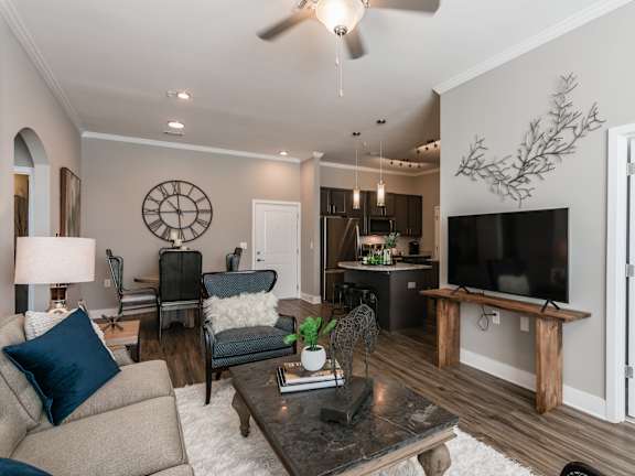 a workout room with weights and cardio equipment in a home gym
