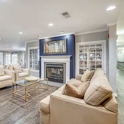 Clubroom With Fireplace at Kendrick Court Senior Apartments, Herndon, VA