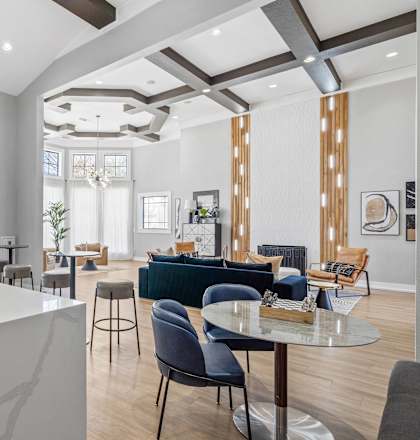 a living room with a kitchen and a dining room