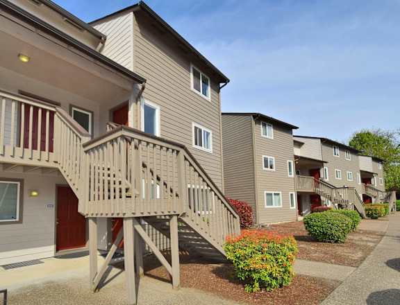 a view of an apartment building with a staircase