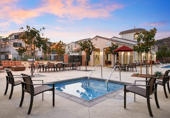 hot tub and seating at Mitchell Place Apartments in Murrieta, CA