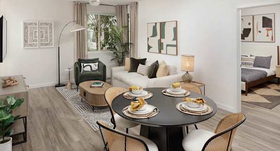 A modern kitchen and dining area with a pool table.