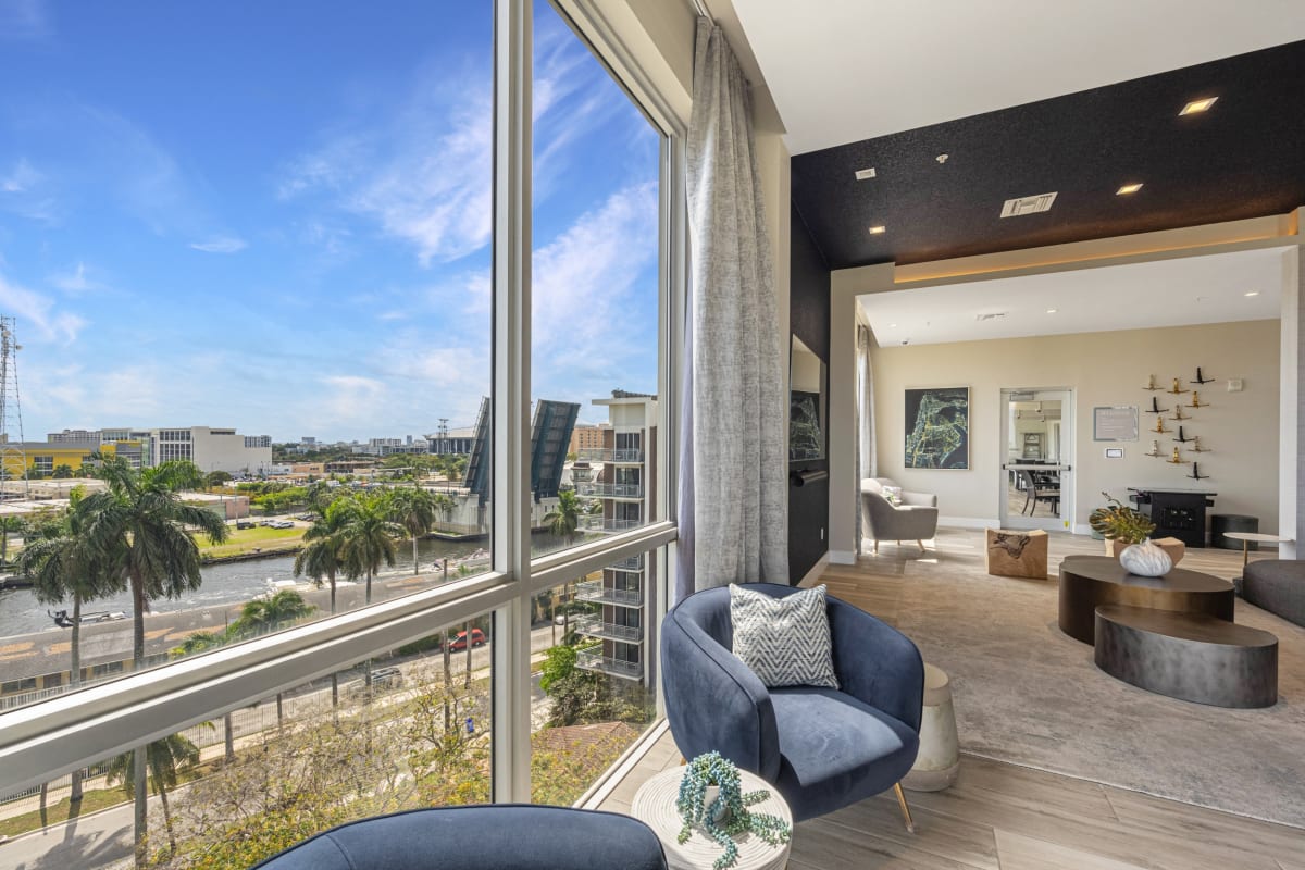 Riverhouse at 11th Apartments lounge seating with city views - Miami, FL