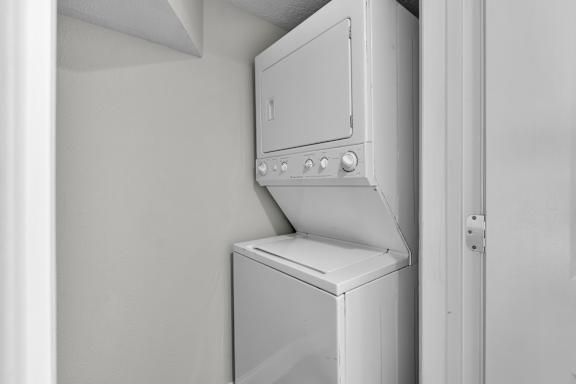 Stacked washer dryer at Avia Apartments at Reedy Creek, Kissimmee, FL