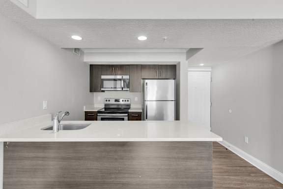 Contemporary Kitchen at Avia Apartments at Reedy Creek, Kissimmee, FL