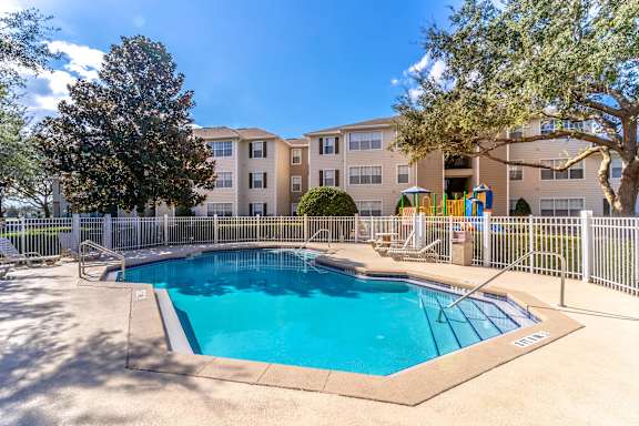 A promotional image for a lease special offering up to one month free on select 3 and 4 bedroom apartment homes.