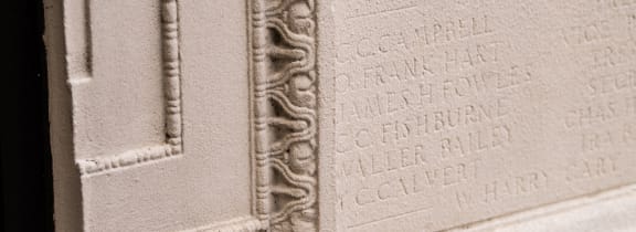 A close up of a stone plaque with carved text at The Lady, South Carolina