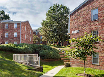 A red brick building with the number 201-205 on it.