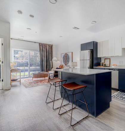 Modern kitchen with island at The Opal apartments in West Valley City near Salt Lake City, UT