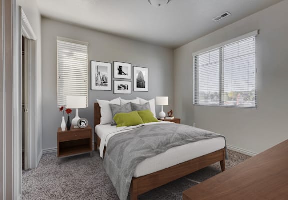 a bedroom with a bed and two nightstands and a window