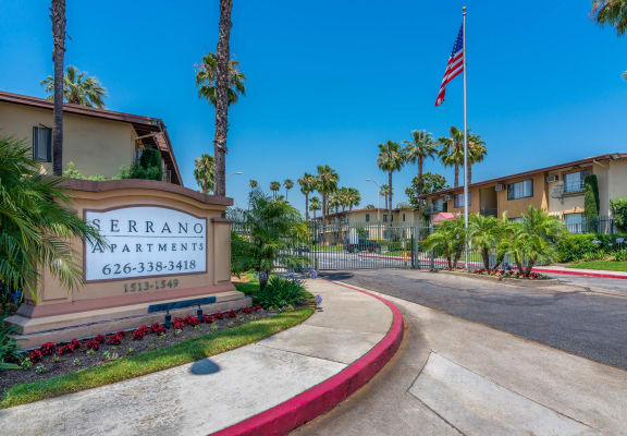 Entrance to complex showing name Serrano Apartments at Serrano Apartments, West Covina