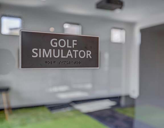 a sign for golf simulator