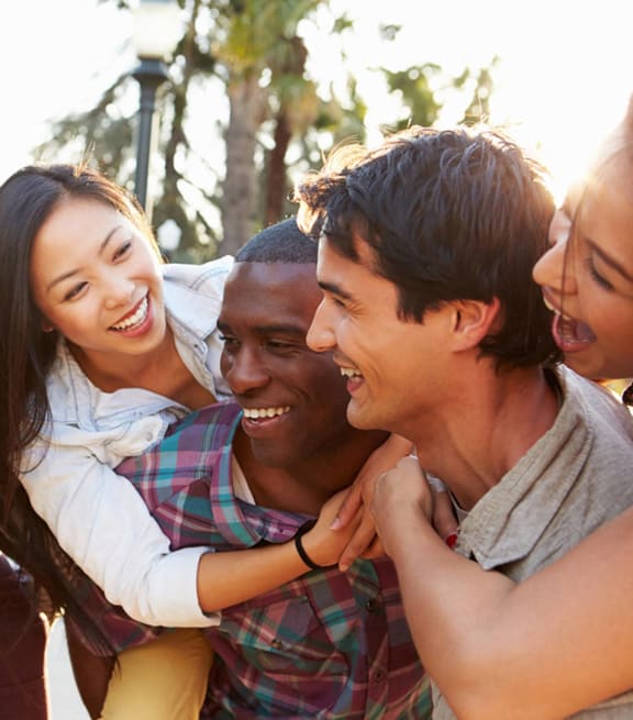 a group of friends posing for a picture together