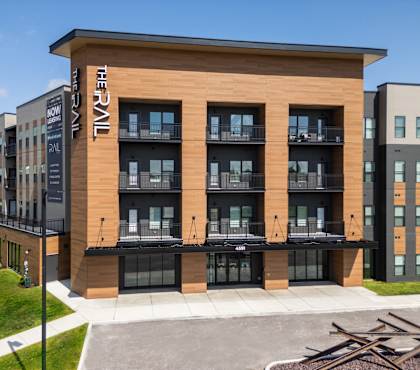 The front of a building with the word "RAIL" on it.
