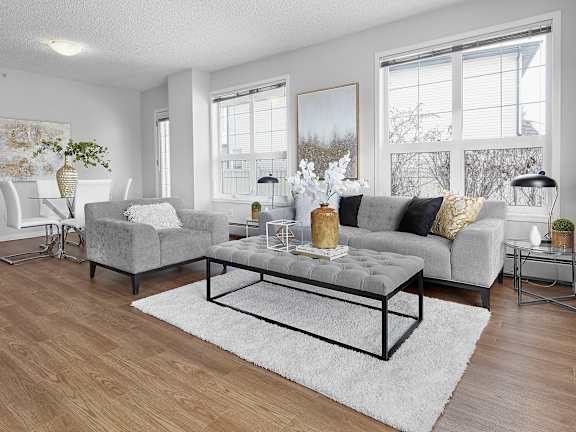 a living room with a couch and a coffee table