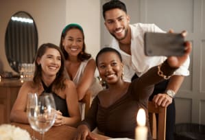 a group of people sitting at a table